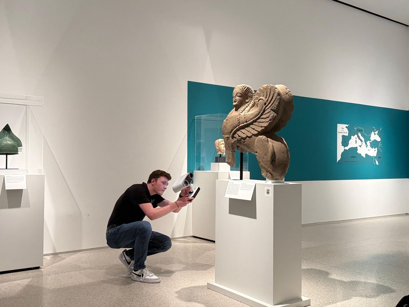 Scanning a limestone sphinx sculpture in a museum gallery